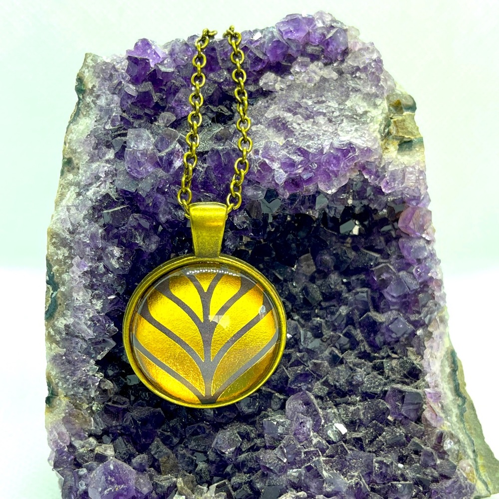 Bronze and gold color glass pendant